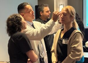 Anatomical landmarking session where doctors are practicing placing injection sites.