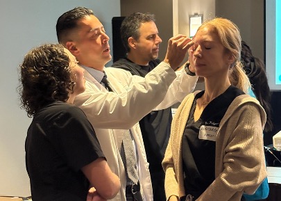 Study-Club-session Anatomical landmarking session where doctors are practicing placing injection sites.